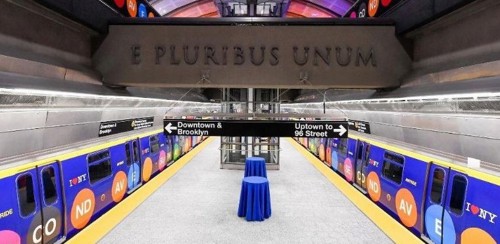 A stock image showing the 72nd street station with Latin wording E Pluribus Unum on a concrete cross beam